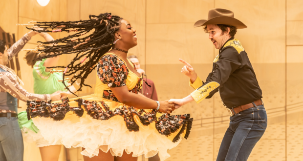 Georgina Onuorah (Ado Annie), James Patrick Davis (Will Parker) dancing in Oklahoma