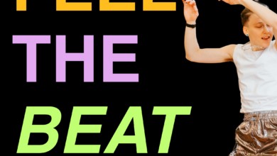 This image advertises a dance show made for visually impaired and sighted people. On the right in large letters it says “Feel The Beat” and below in smaller letters “Listen. Feel. Dance by Jodie & Co”. On the left, a person with short hair in a white vest top and shiny shorts, with their arms raised in the air. Their eyes are closed and their mouth is open.